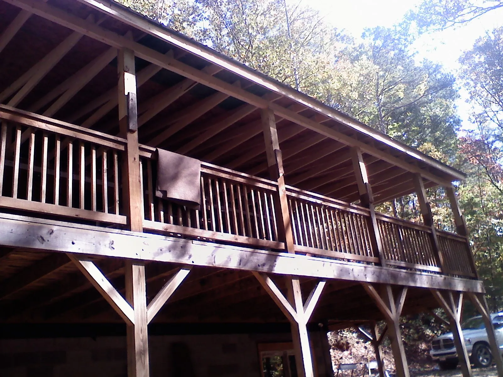 Timber framing under a new elevated porch and deck — Roof Leak Repair in Dauphin by Roofing Brothers